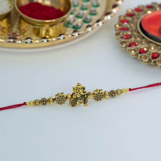 Genesha Playing Sitar with Rudraksh Designer Rakhi