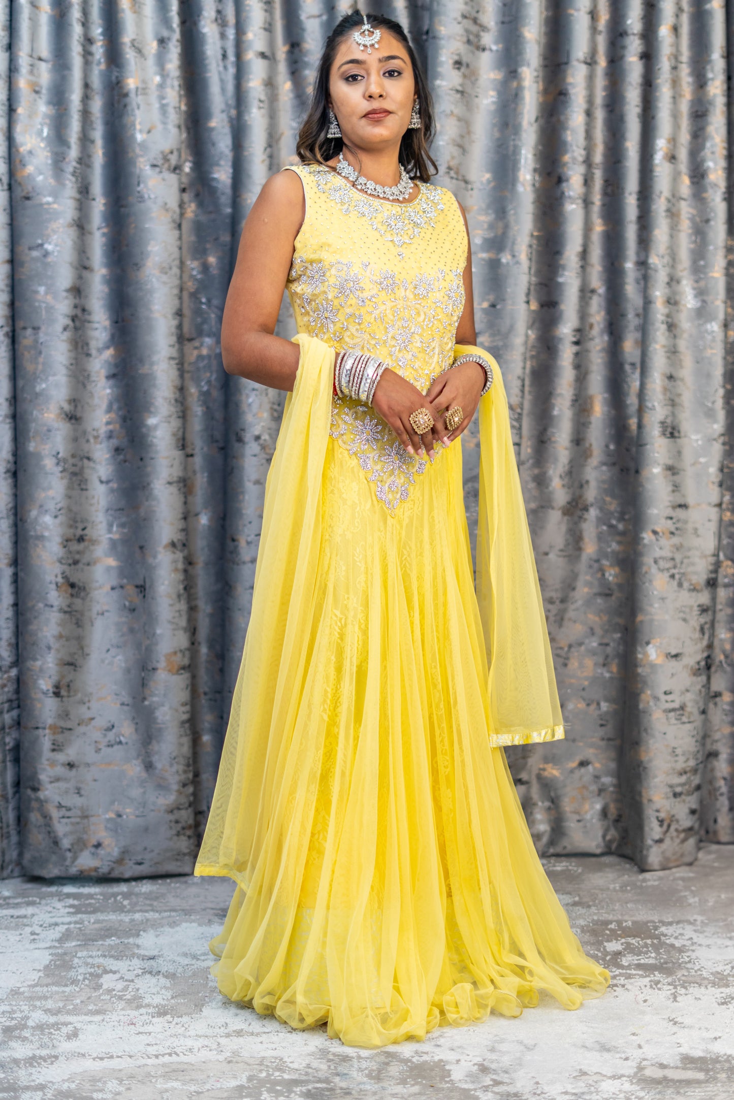 Yellow Net Punjabi Set with Swarovski Stone Work
