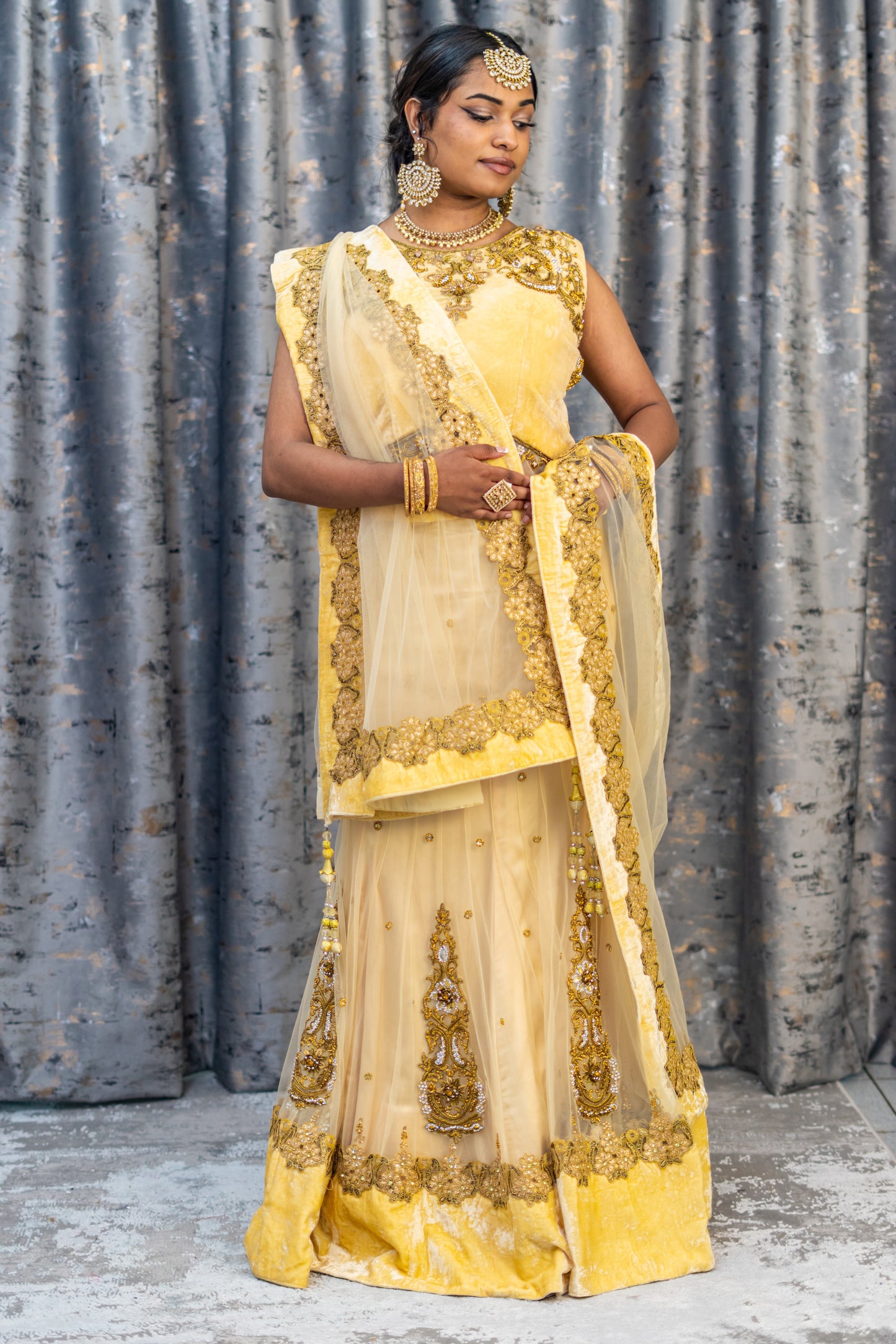 Cream with Gold Net Lehenga Set wit Swarovski Stone Work