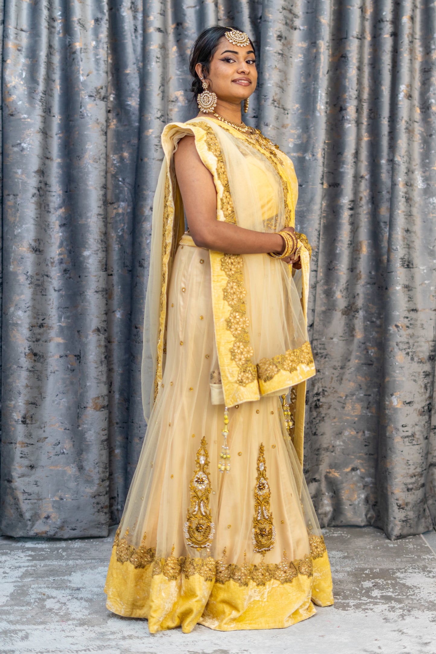 Cream with Gold Net Lehenga Set wit Swarovski Stone Work