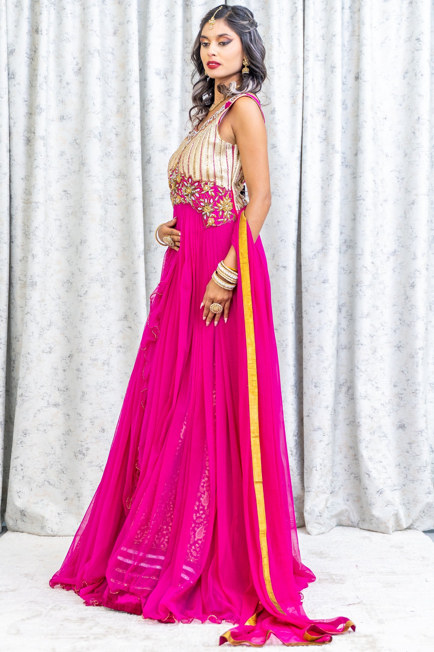 Rani Pink Net Lehenga Choli with Brocade & Swarovski Stone Work