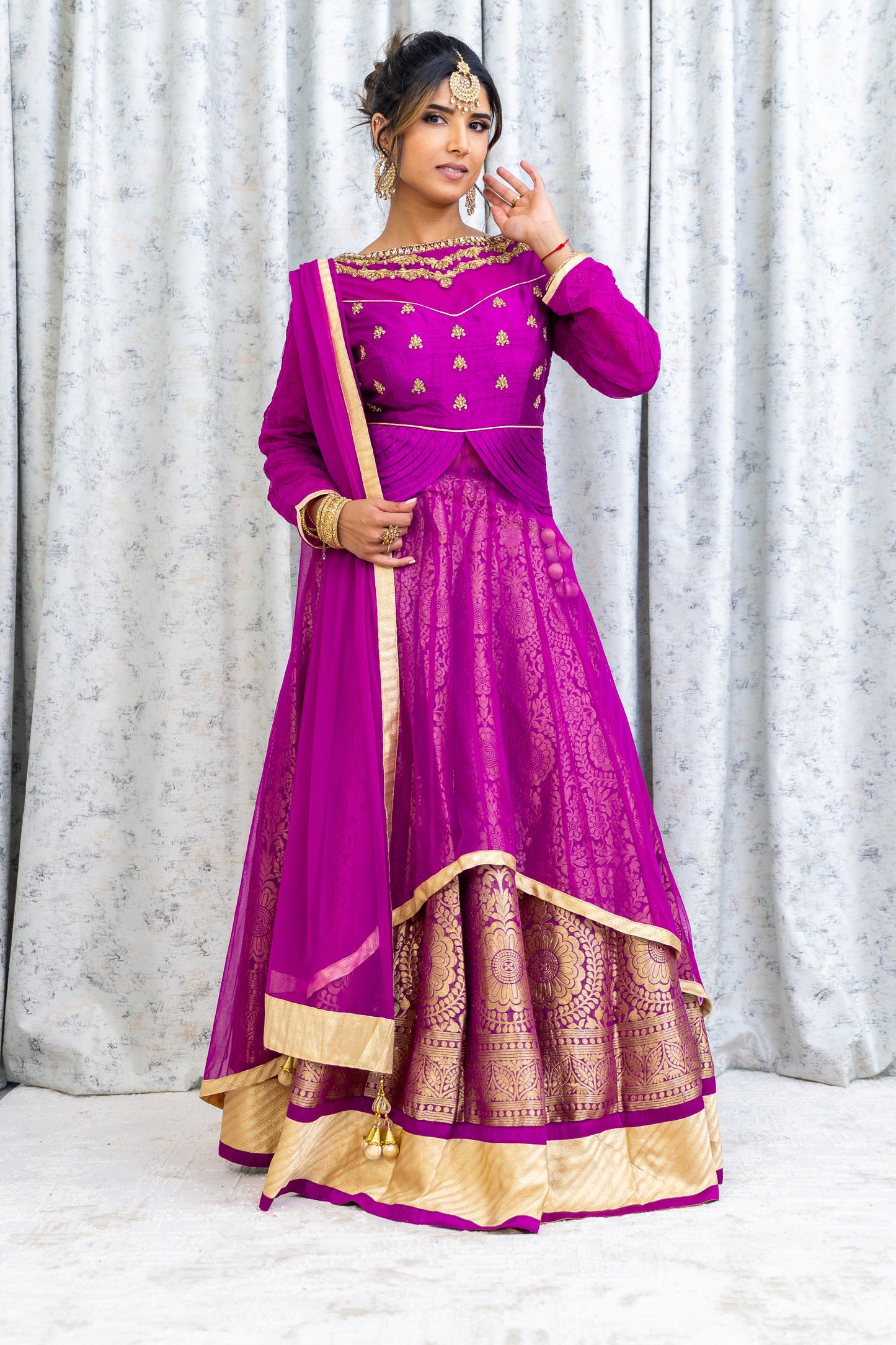 Purple Net Lehenga Choli with Brocade & Swarovski Stone Work