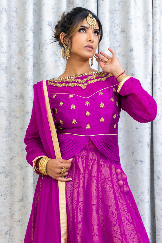 Purple Net Lehenga Choli with Brocade & Swarovski Stone Work