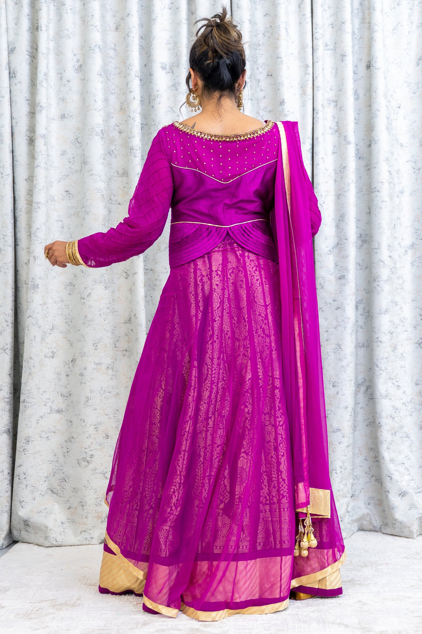 Purple Net Lehenga Choli with Brocade & Swarovski Stone Work