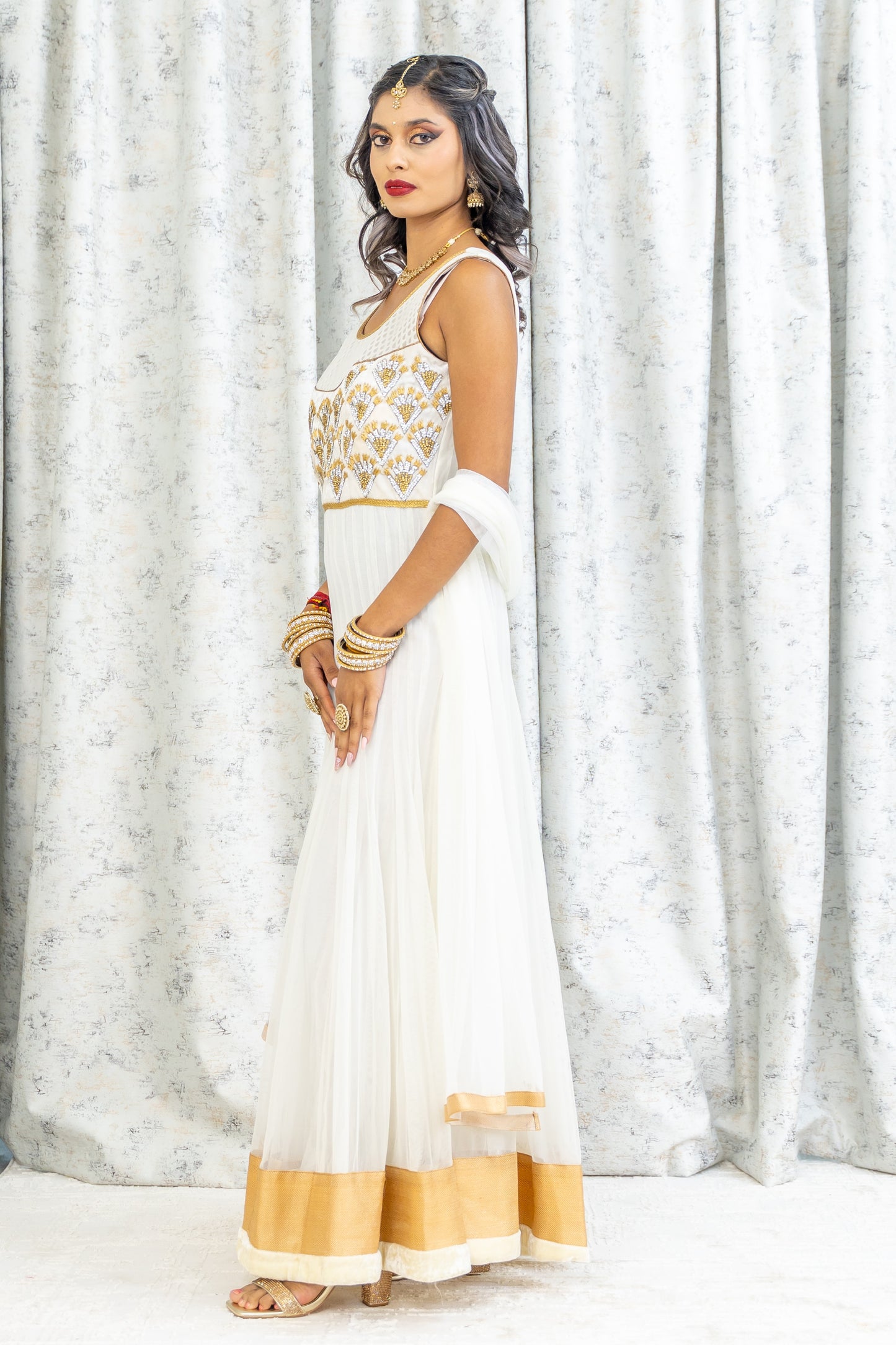 White Net Punjabi Set with Gold & Silver Swarovski Work