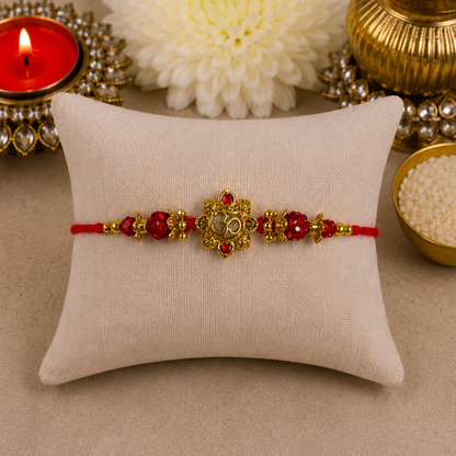 Cutout Aum with Red Swarovski Designer Rakhi