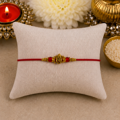Mini Ganesha with Red Crystals Designer Rakhi