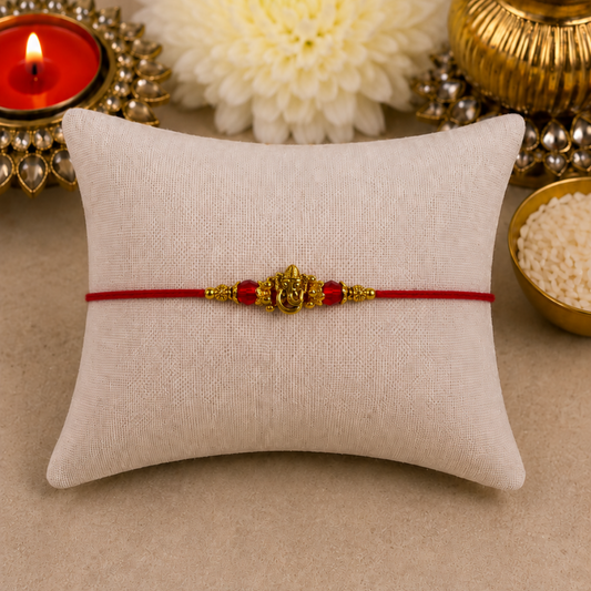 Mini Ganesha with Red Crystals Designer Rakhi