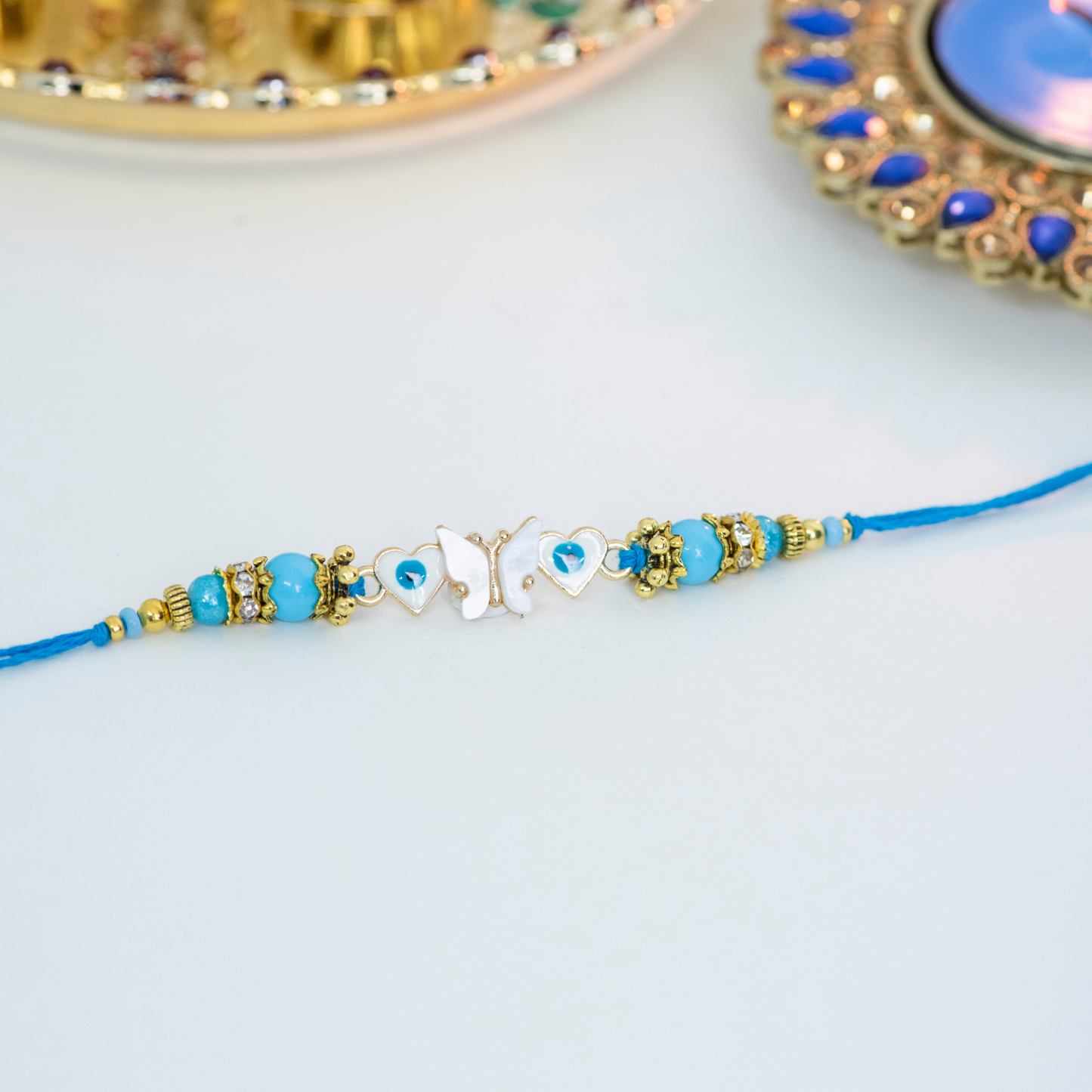 Blue & White Butterfly with Evil Eye Designer Rakhi