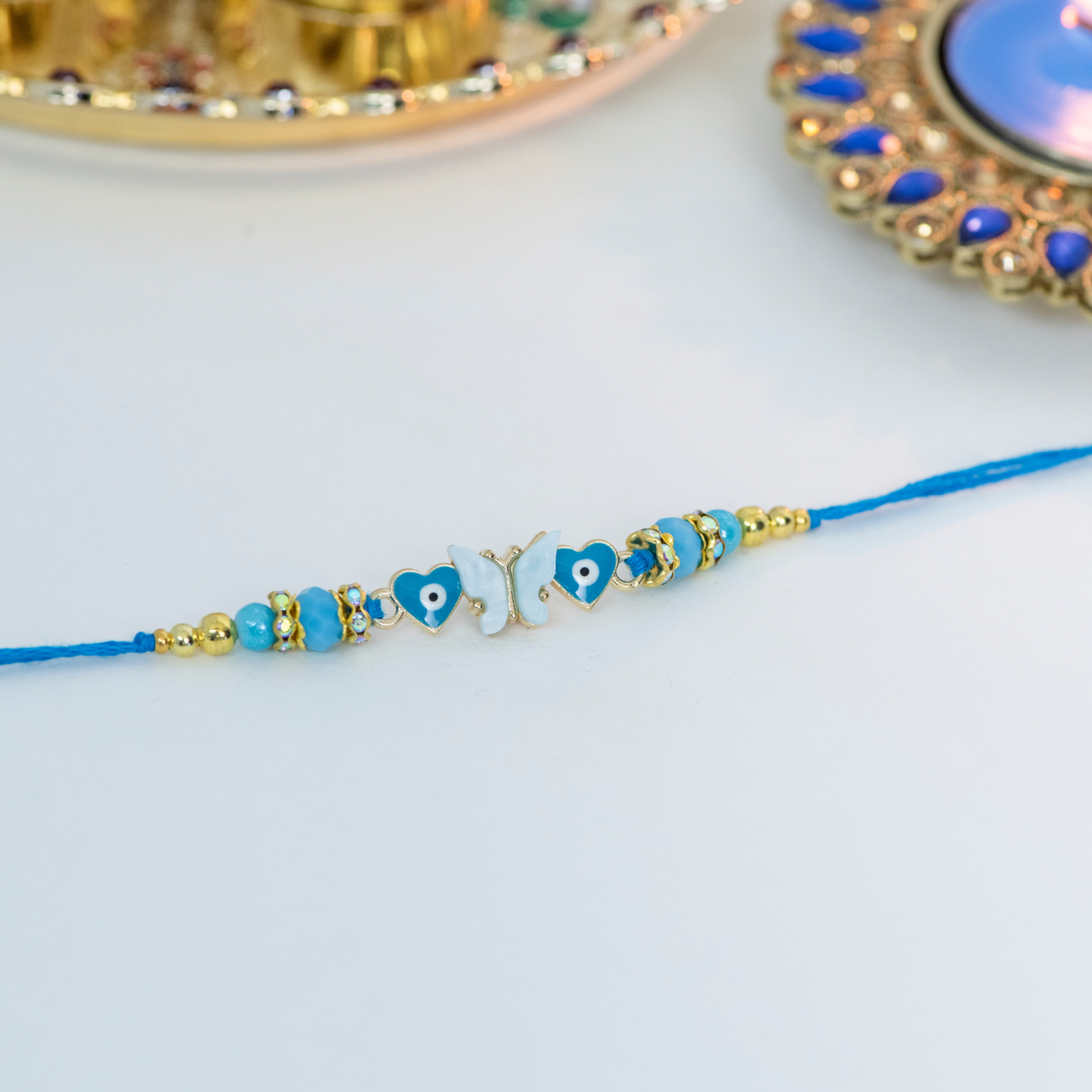 Blue & White Butterfly with Evil Eye Designer Rakhi