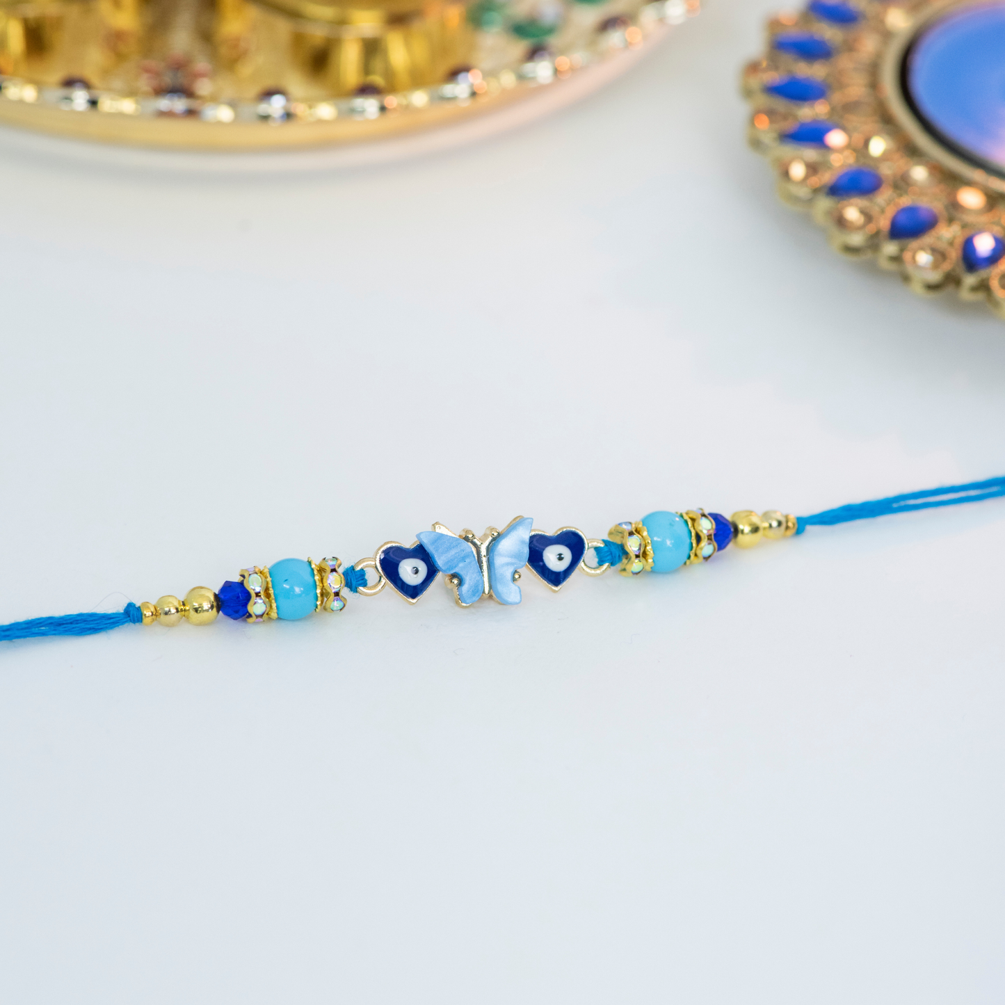 Blue & White Butterfly with Evil Eye Designer Rakhi