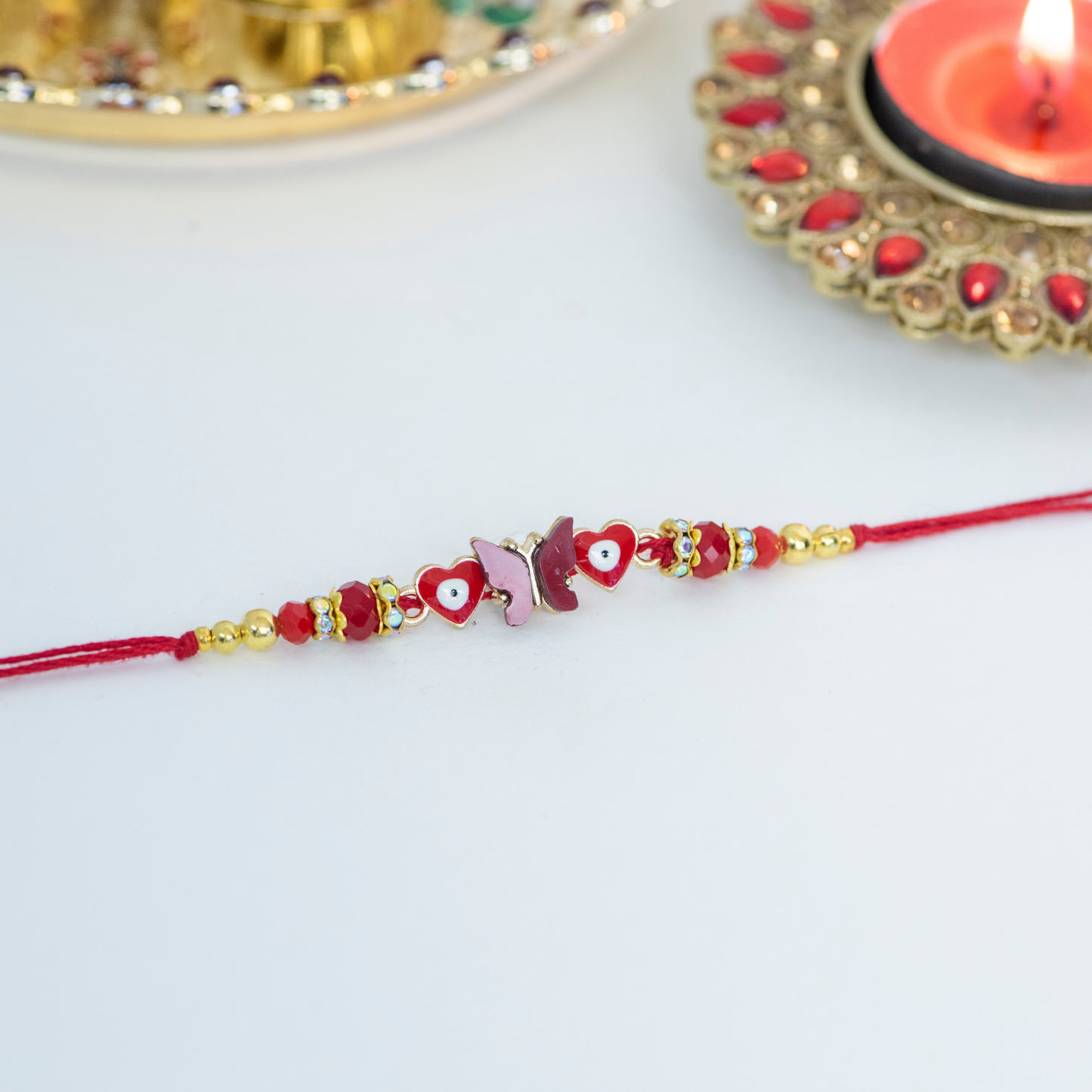 Blue & White Butterfly with Evil Eye Designer Rakhi