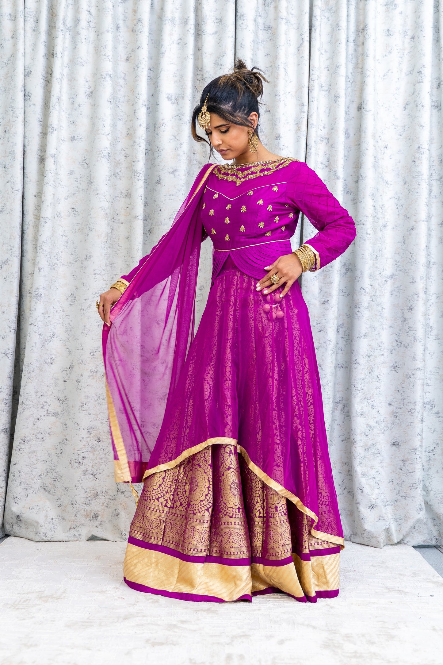 Purple Net Lehenga Choli with Brocade & Swarovski Stone Work