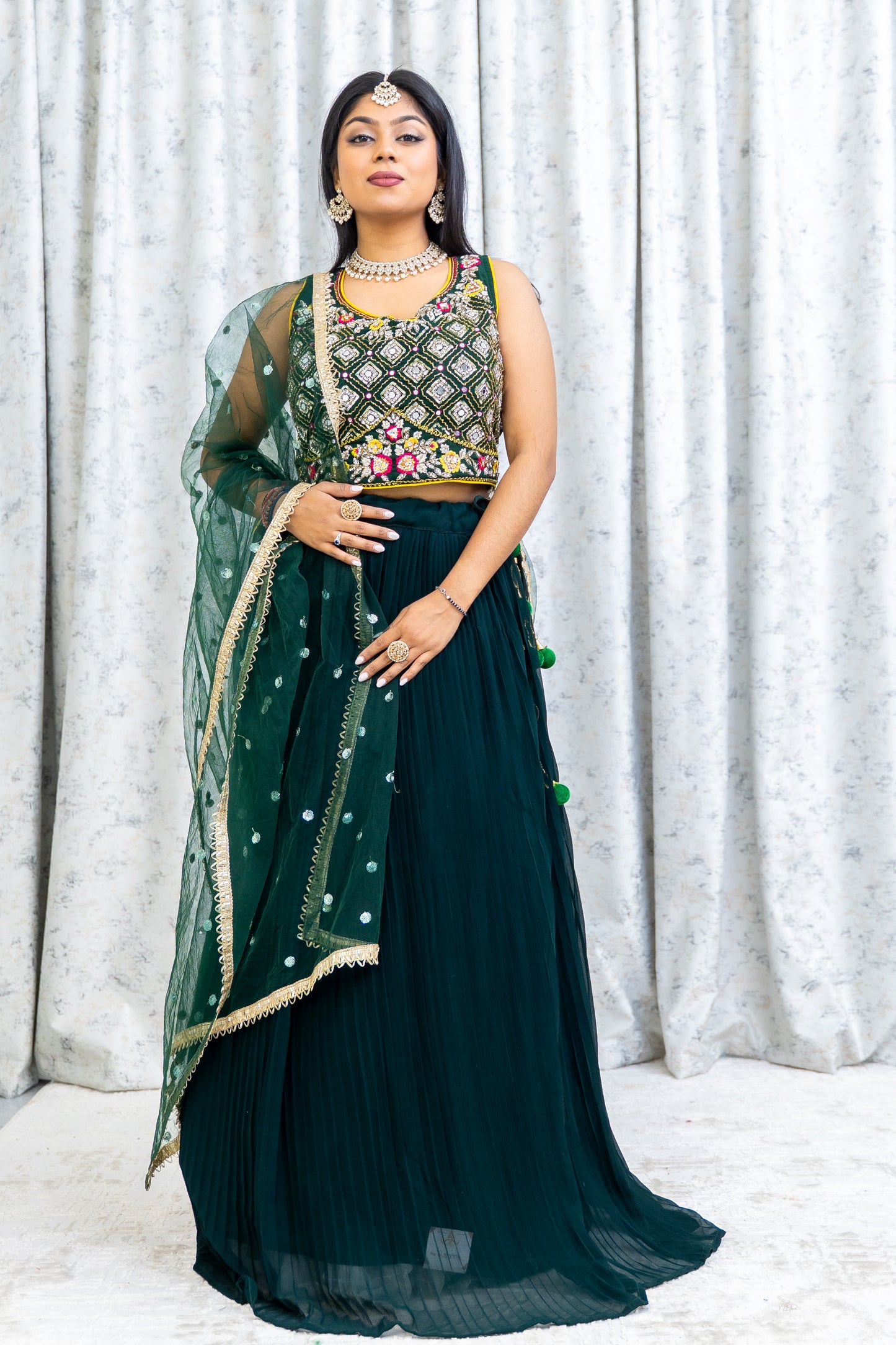 Emerald Green Chiffon Crimped Lehenga Choli with Embroidery and Swarovski Stone Work