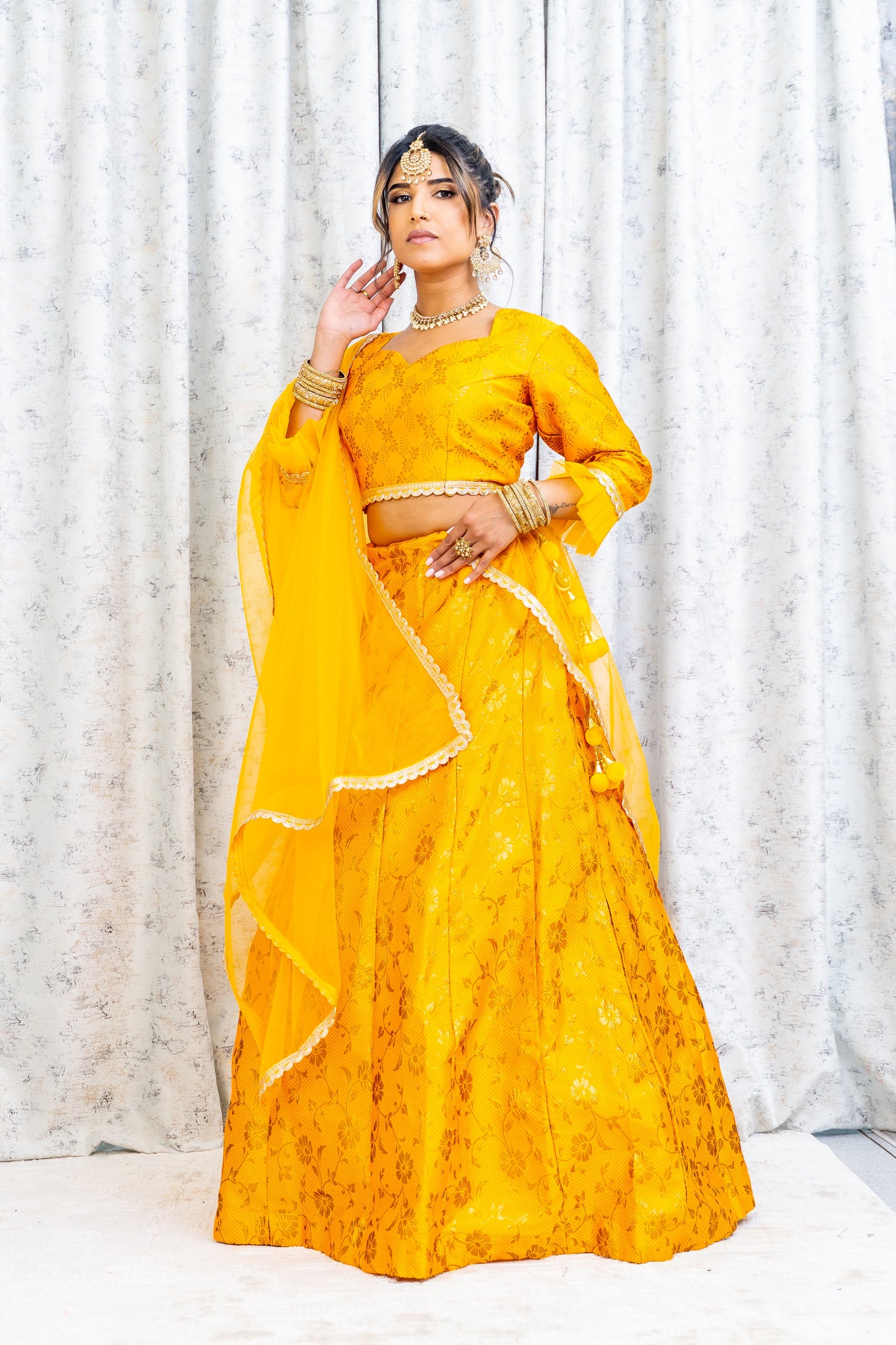 Marigold Brocade Lehnga Choli with Embroidery