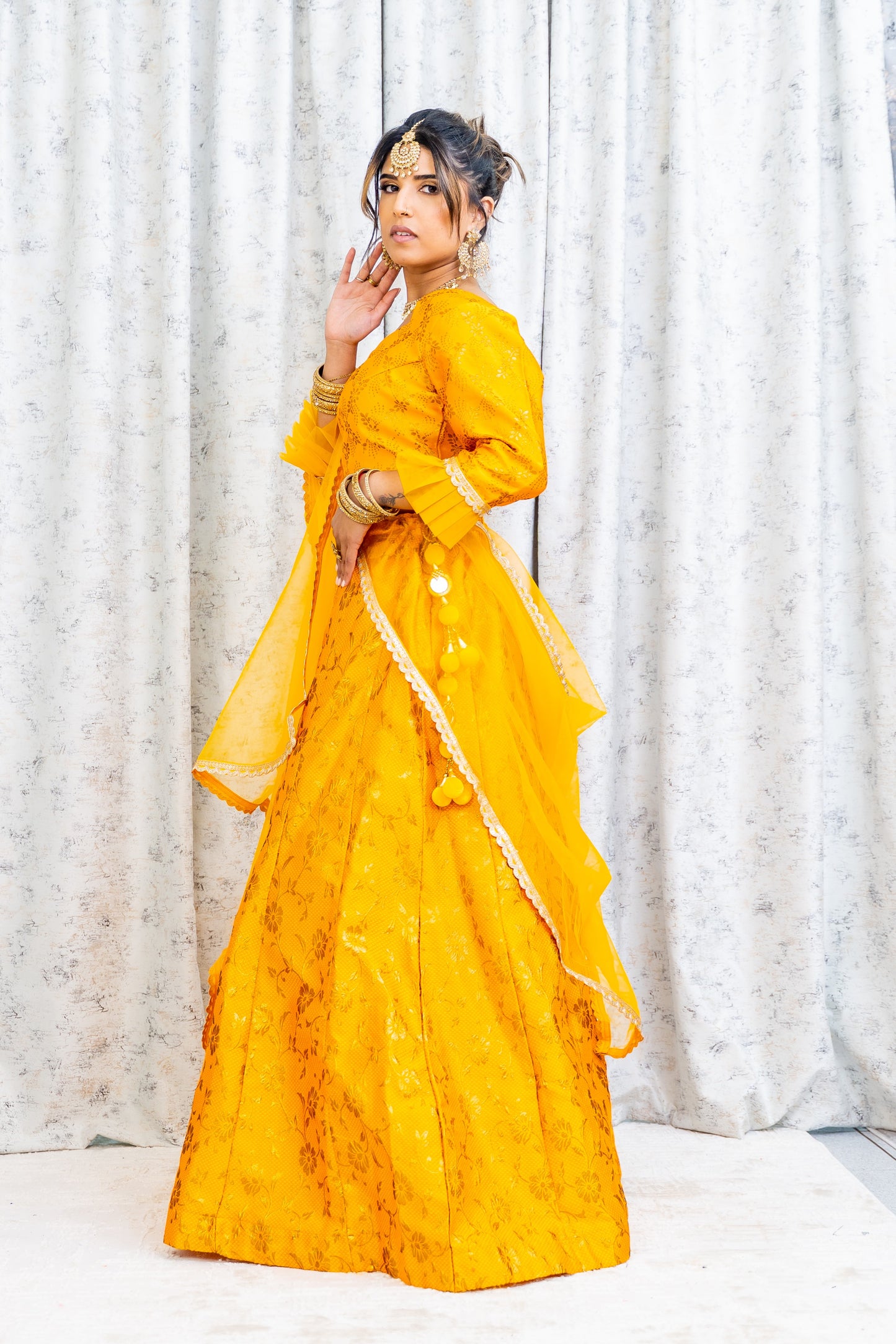 Marigold Brocade Lehnga Choli with Embroidery