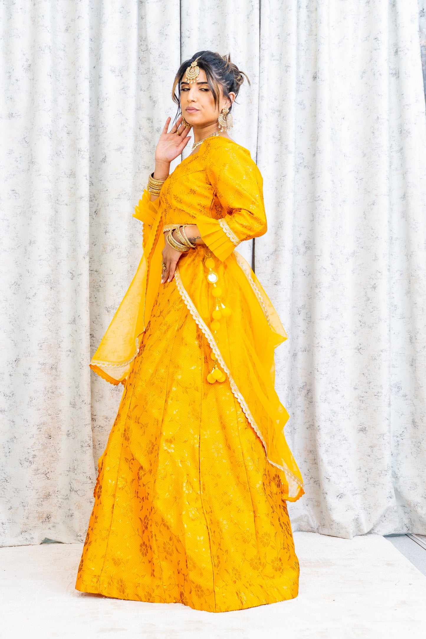 Marigold Brocade Lehnga Choli with Embroidery