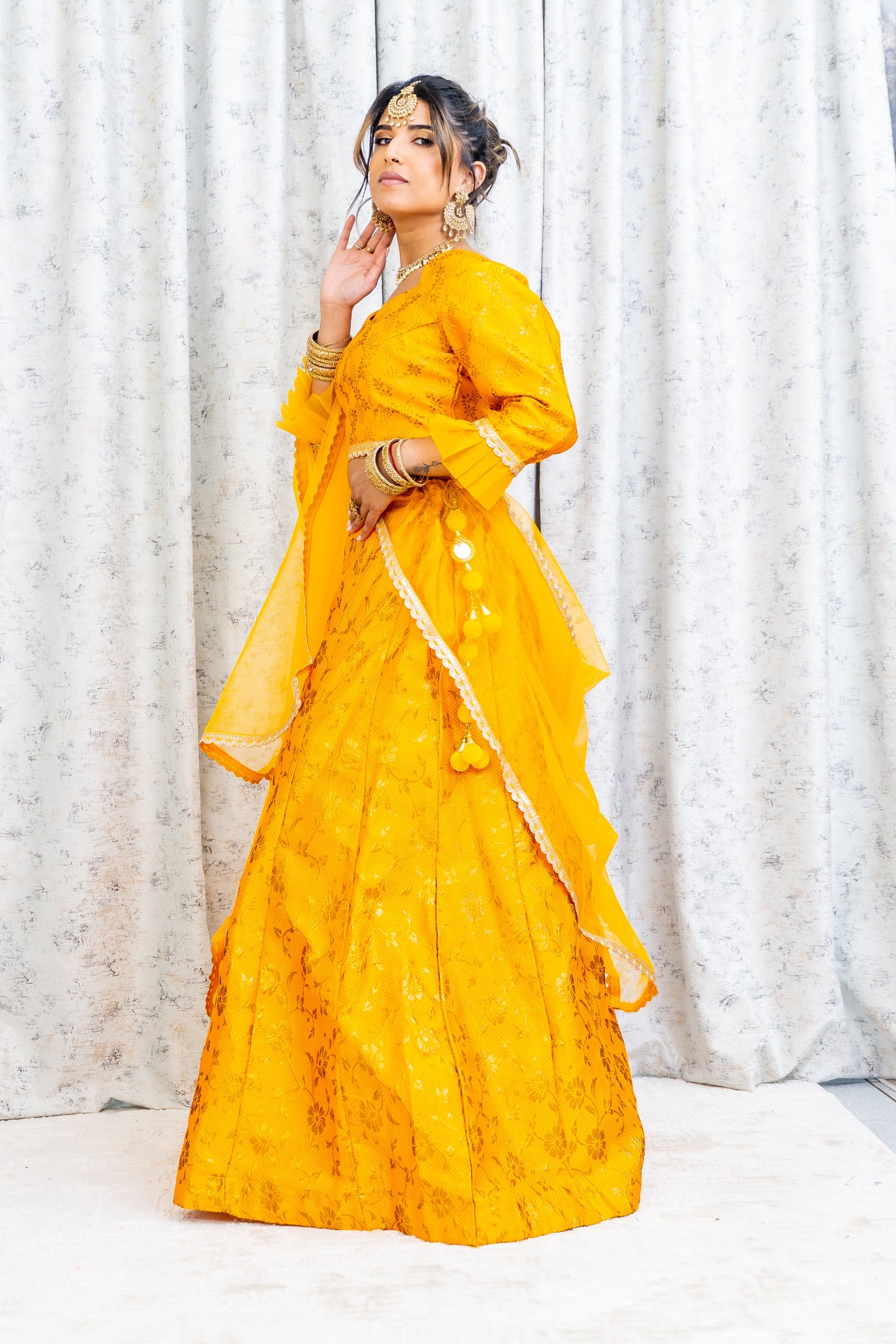 Marigold Brocade Lehnga Choli with Embroidery